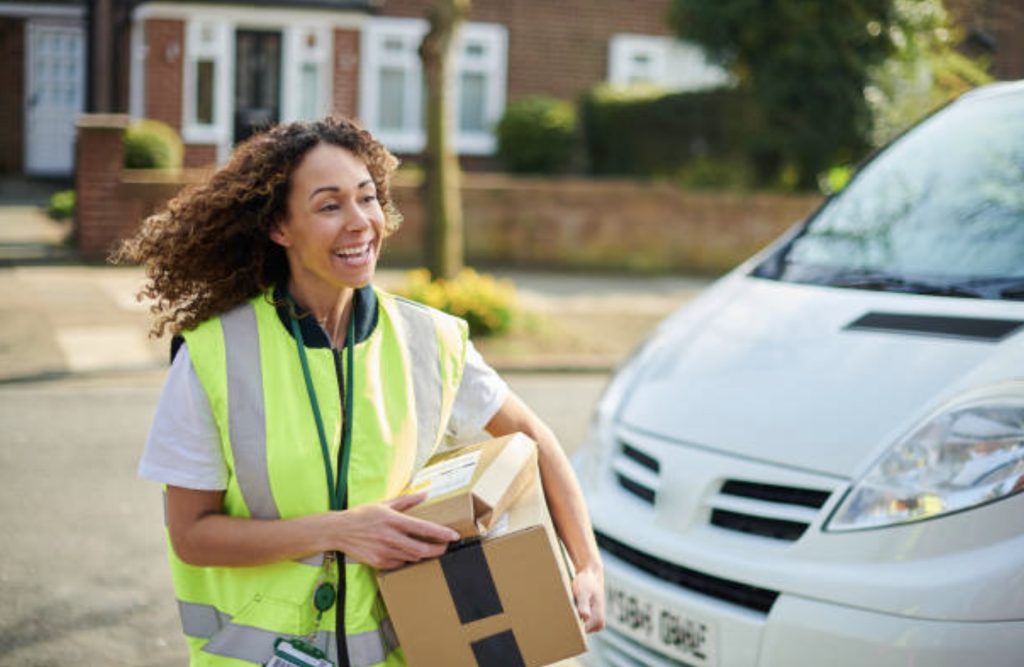 Delivery-girl-wearing-yellow-vest-smiling